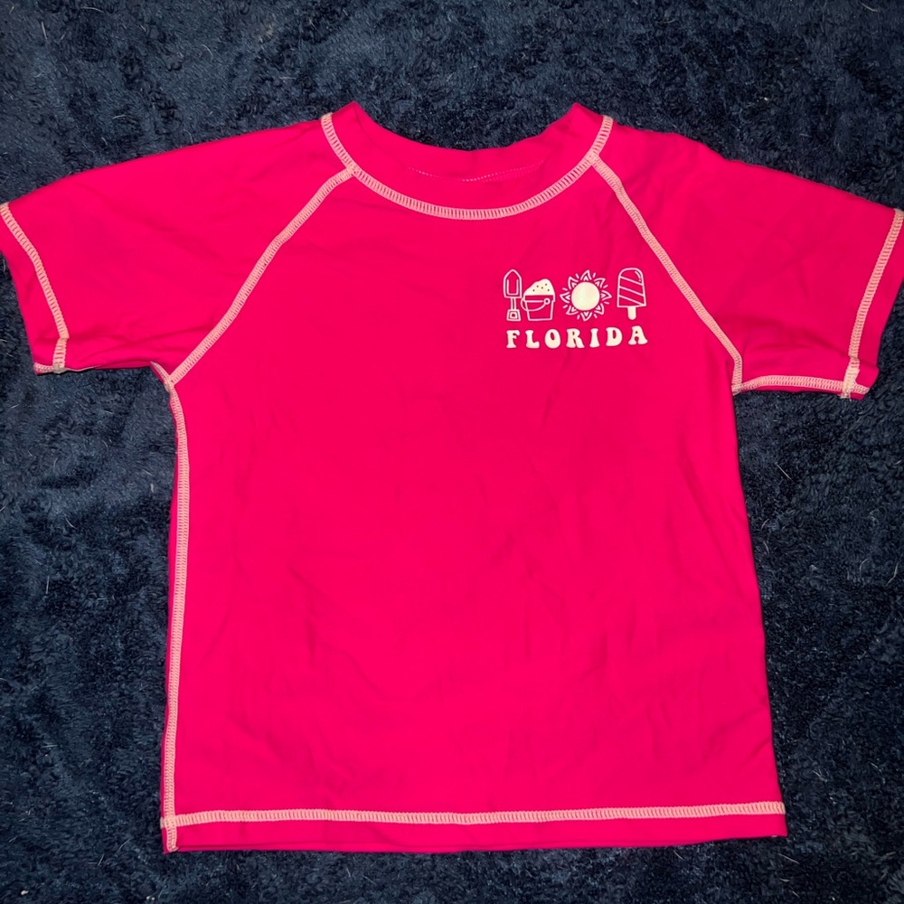 Girls pink rash guard swim shirt